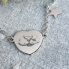 Bracciale catena cuore/charm stella