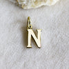 pendente ciondolo lettera N in ottone lucido